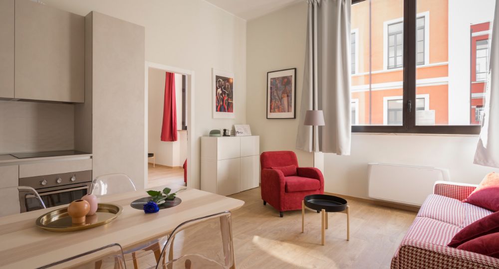 Open-plan sitting room and dining room - luxury student accommodation