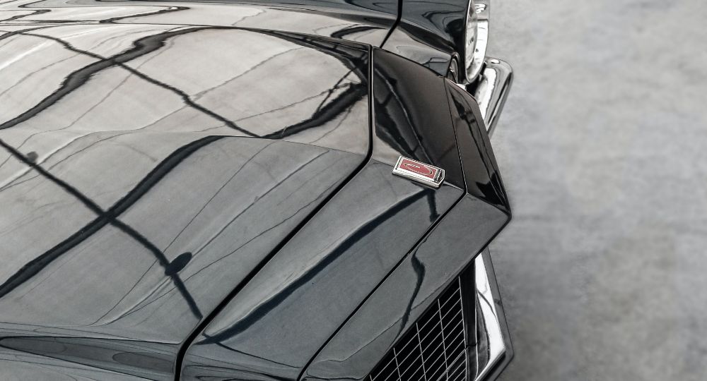 Close-up shot of a black classic American car