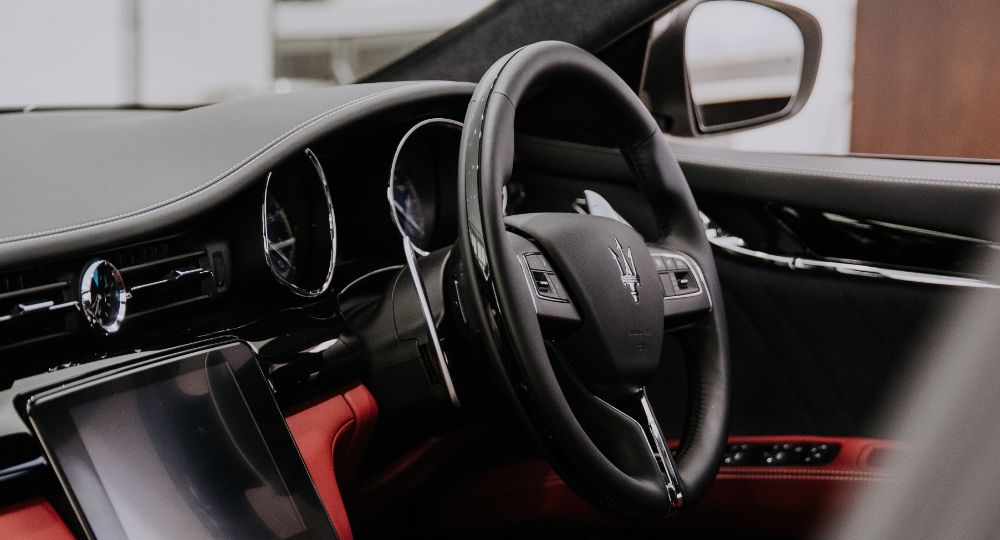 Close up of Maserati driving wheel