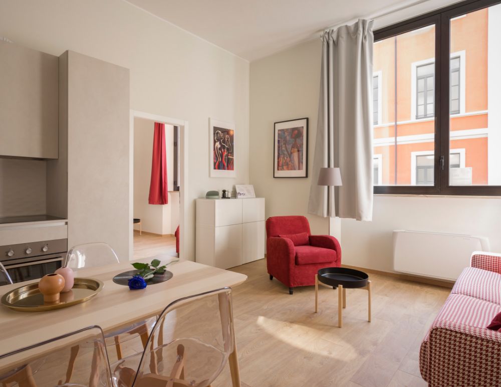 Open-plan sitting room and dining room - luxury student accommodation