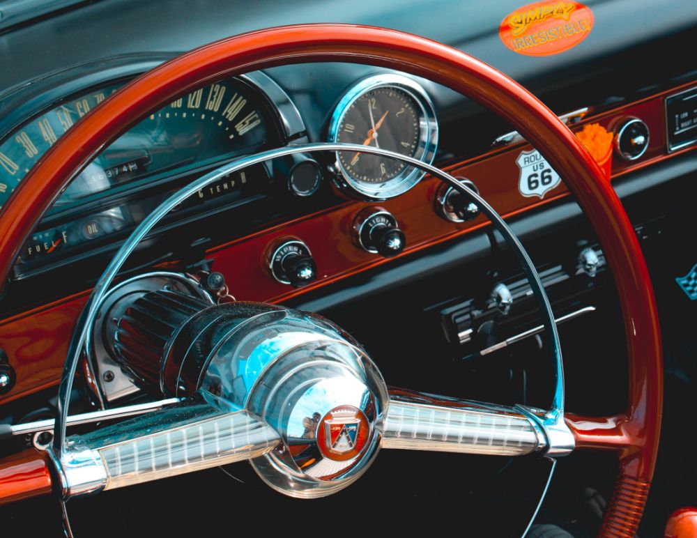 Close-up shot of the dashboard of a classic American car