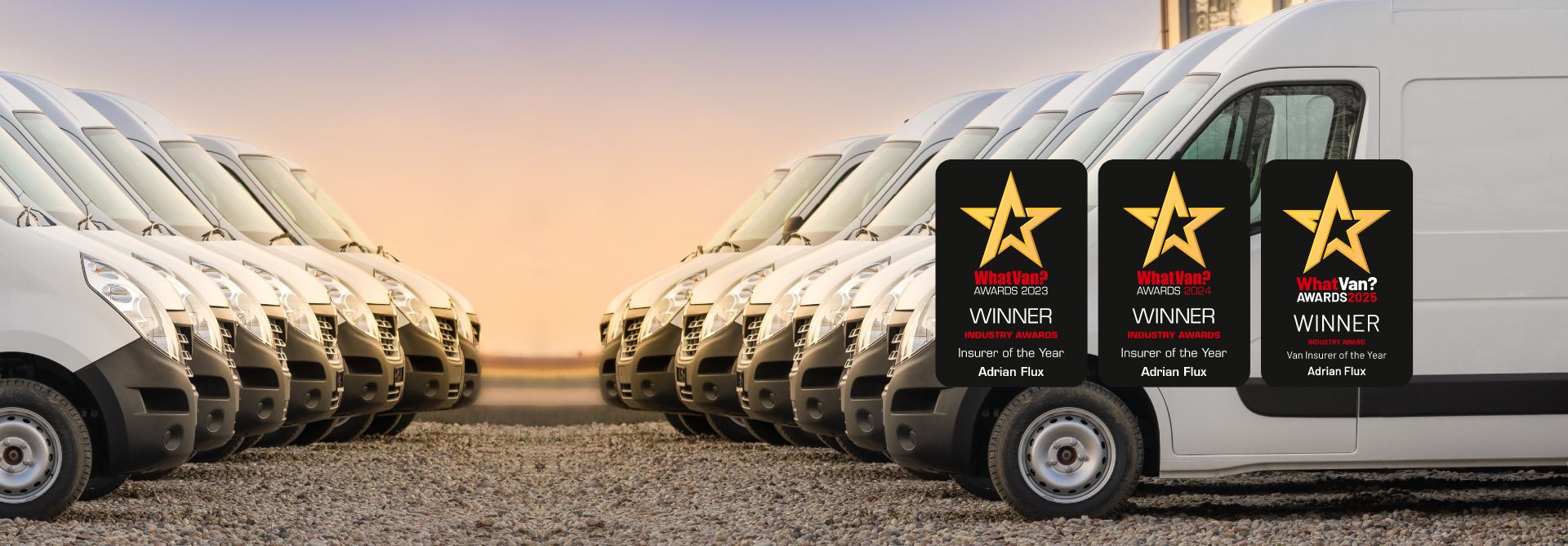 Row of commercial vans parked