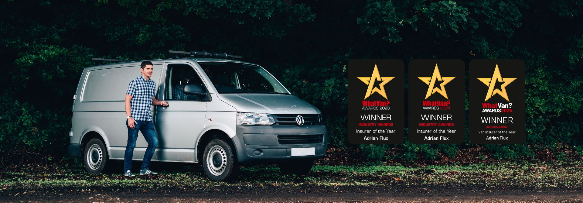 Man standing in front of van parked in the wood