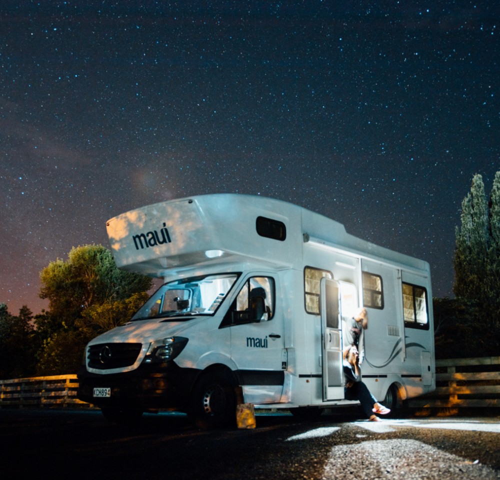Motorhome parked outside at night