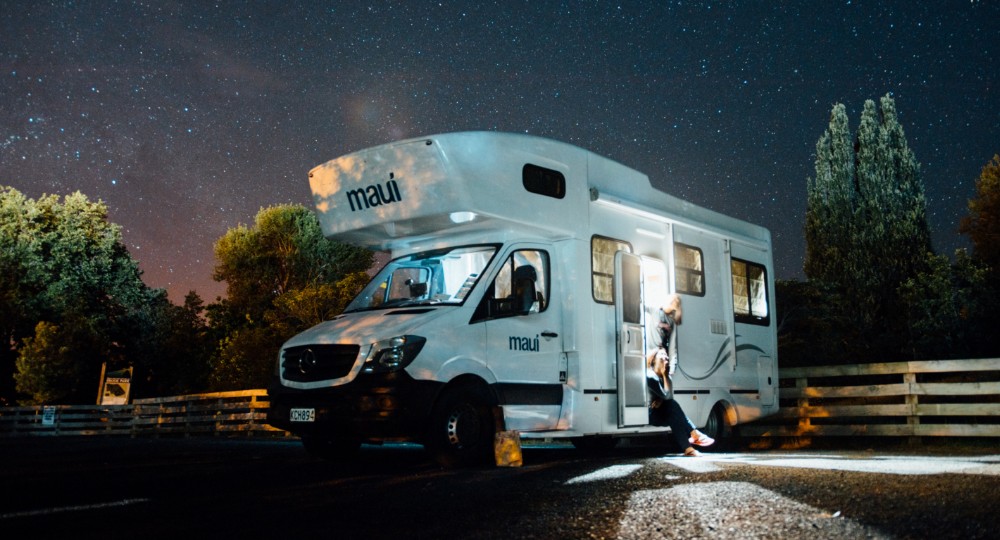 Motorhome parked outside at night