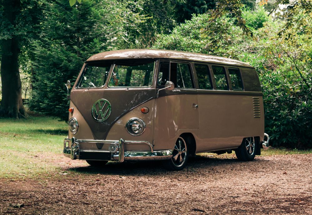 VW camper parked in green area