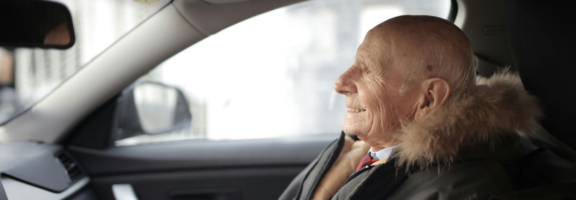 Old man in car
