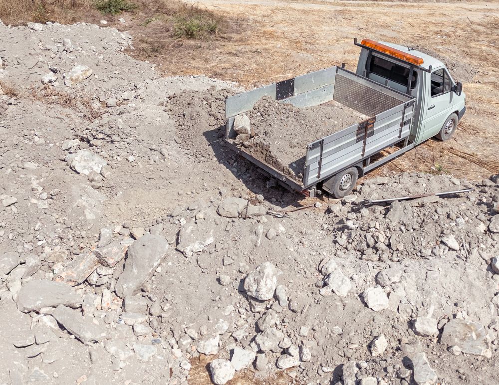 tipper van on rubble building site