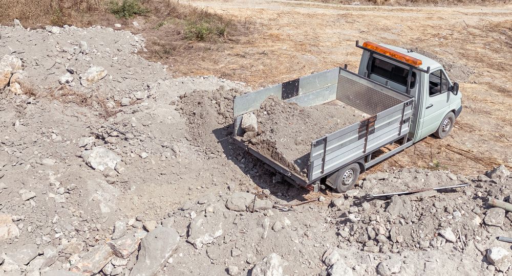 tipper van on rubble building site