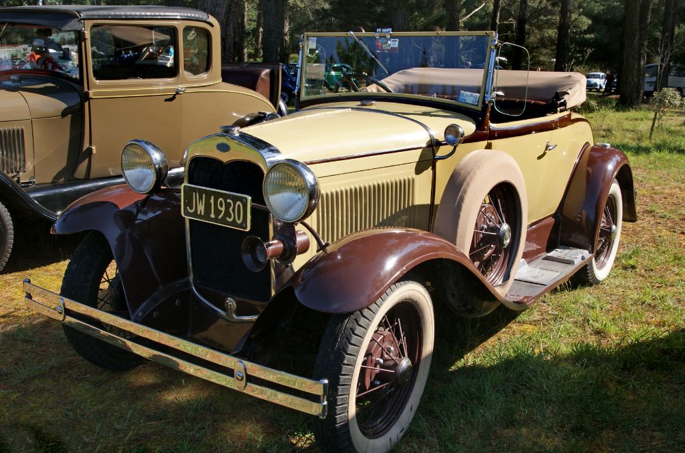 Ford Model A in a field during a car show