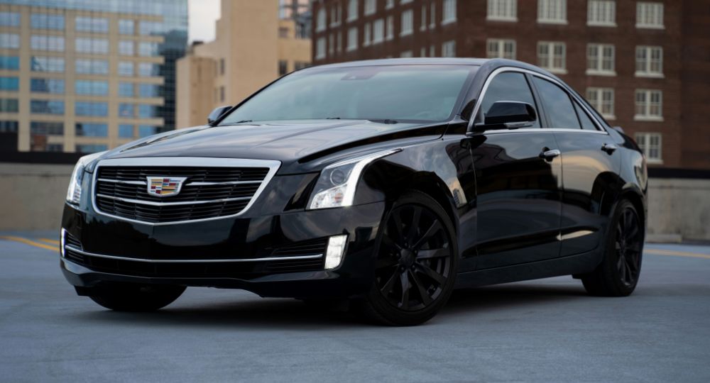 Black Cadillac ATS with black rims