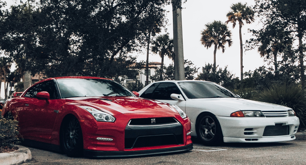 Two performance cars parked next to each other