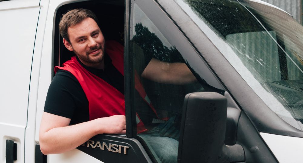 Van driver in driver's seat