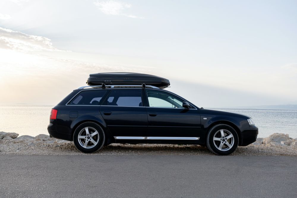 Audi car parked in front of the ocean