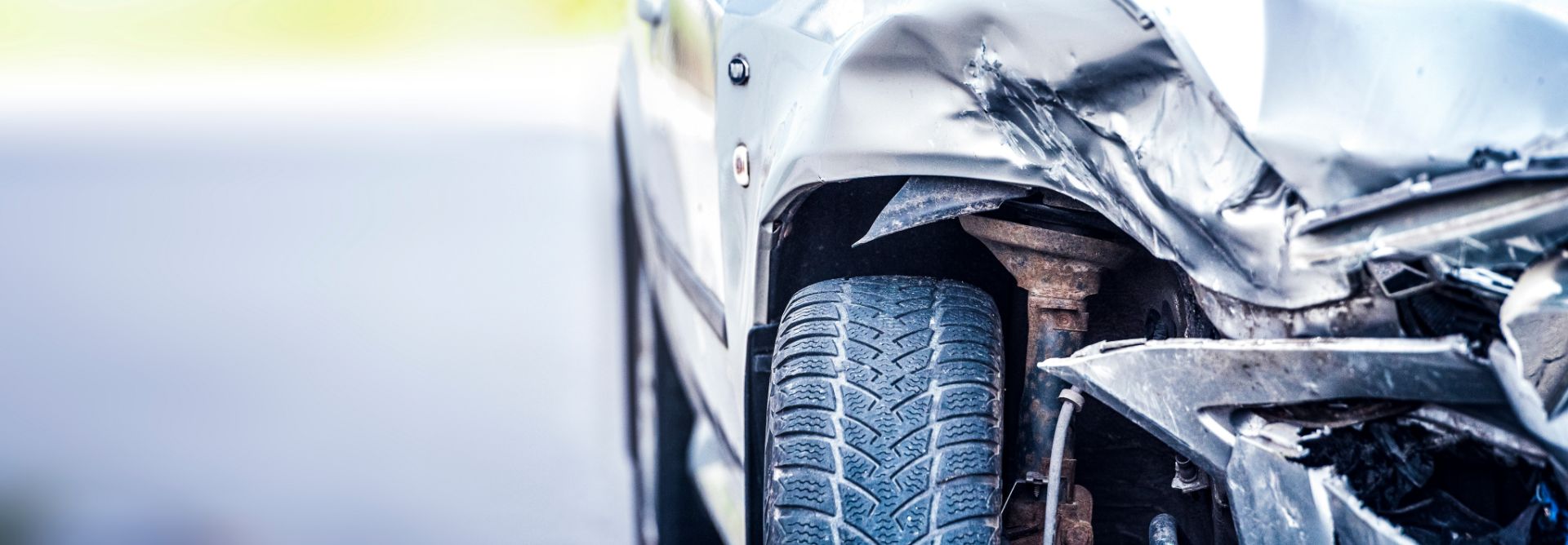 Close up image of a crashed car