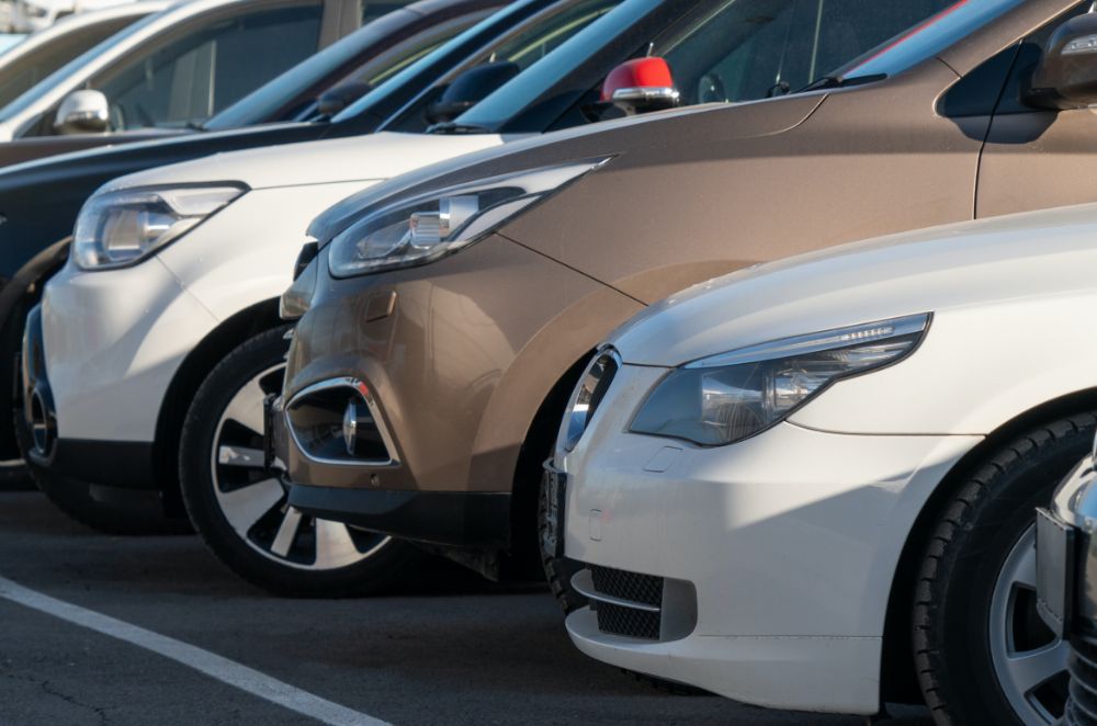 Cars lined up in car park
