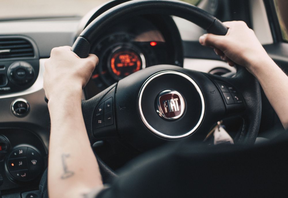 Fiat steering wheel with hands on wheel