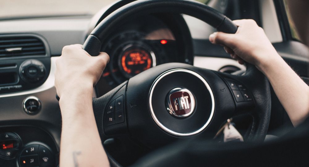 Fiat steering wheel with hands on wheel