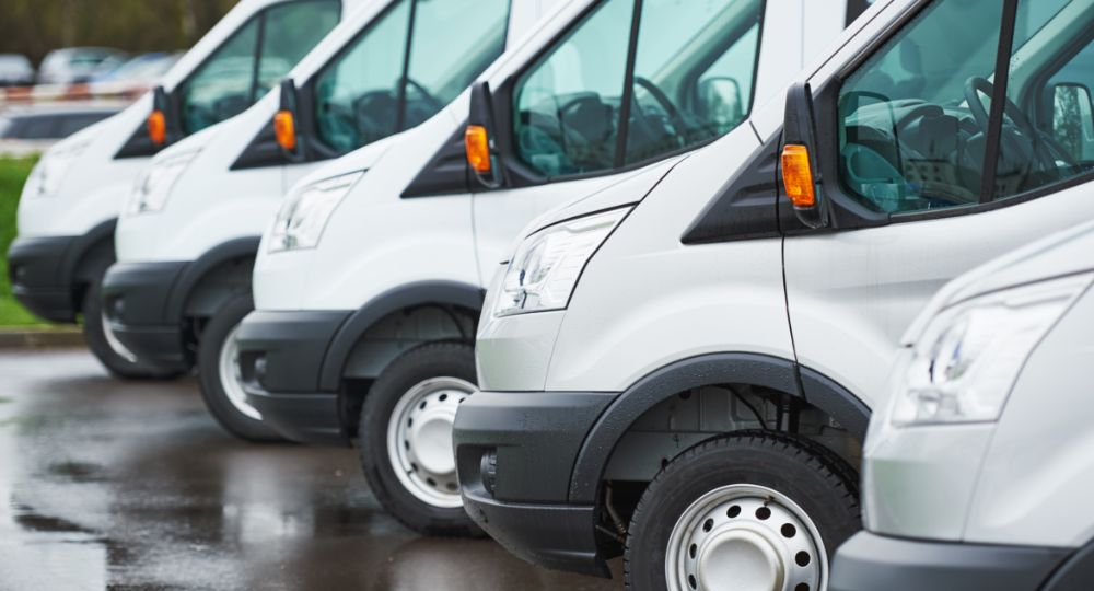 White Ford vans lined up
