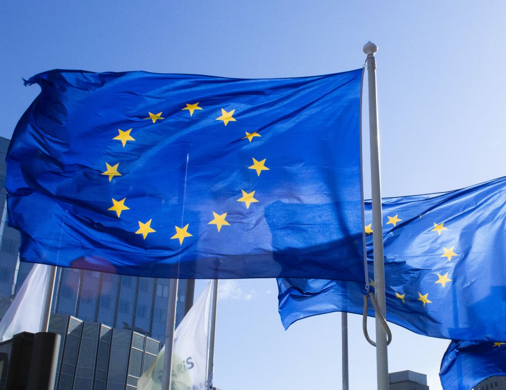 European flags with blue sky outside