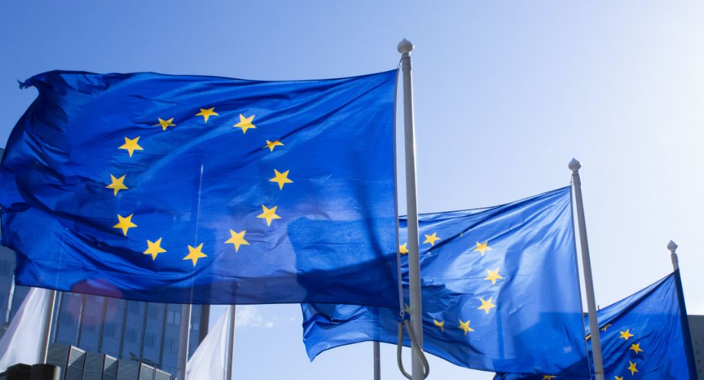 European flags with blue sky outside