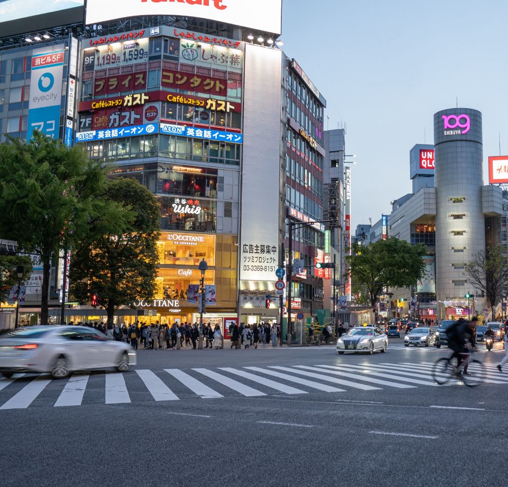 Japanese landscape with cars in the foreground