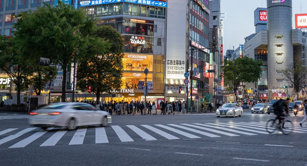 Japanese landscape with cars in the foreground