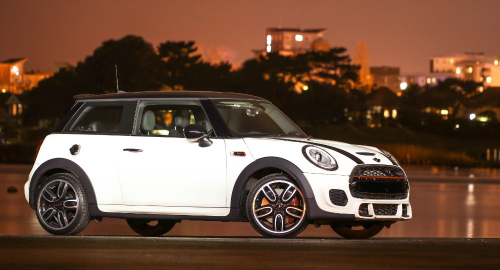 Mini Cooper s outside city at night