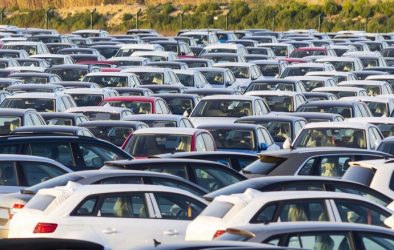 Loads of cars in a parking lot