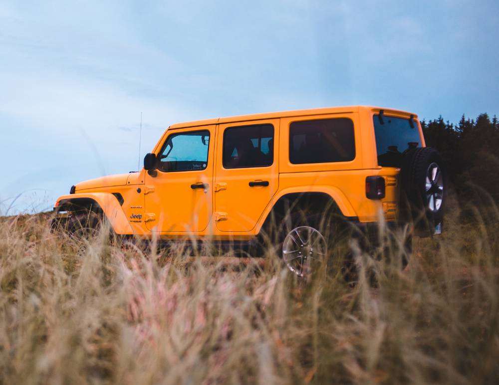 Orange Jeep outside