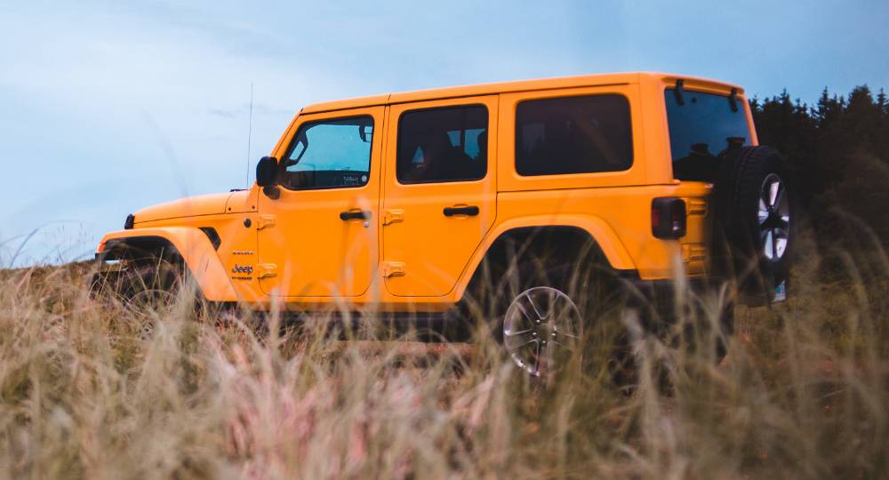 Orange Jeep outside