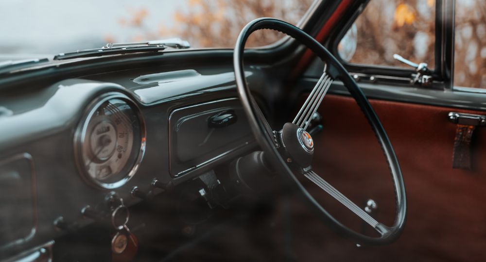 Morris Minor close-up of dashboard interior with wheel