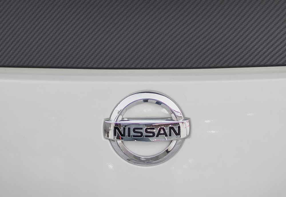 Close-up of the Nissan logo
