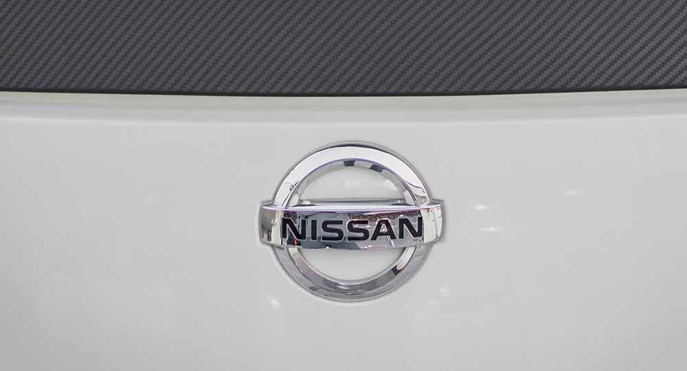 Close-up of the Nissan logo