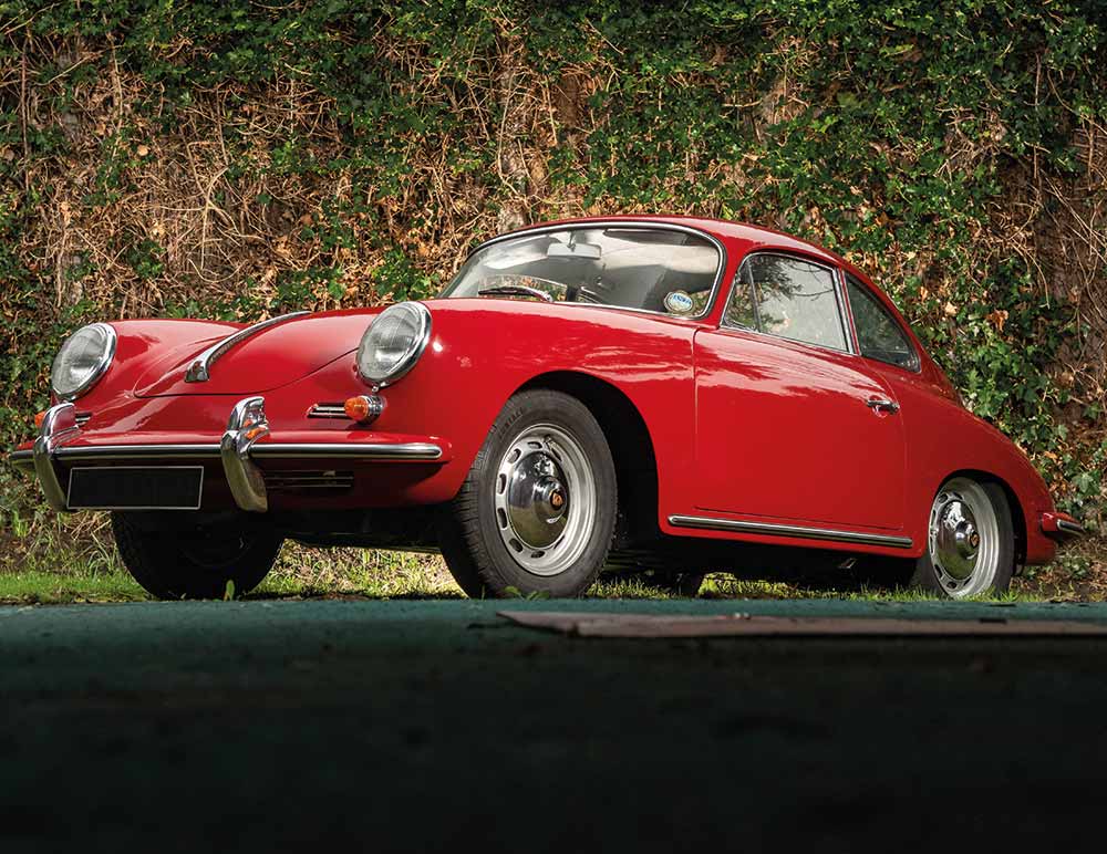 Red Porsche parked outside