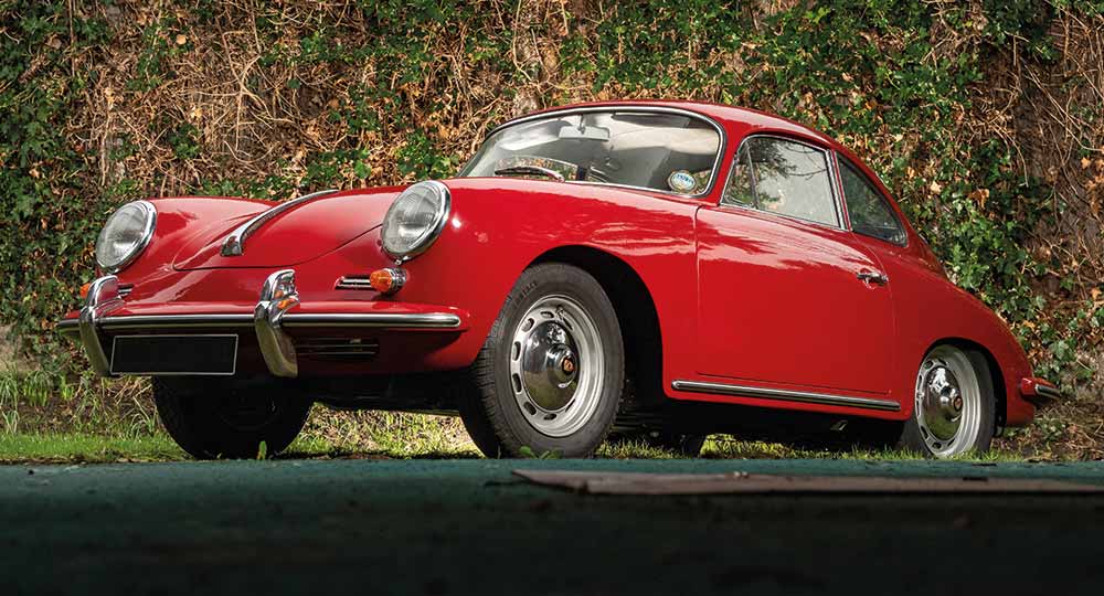 Red Porsche parked outside