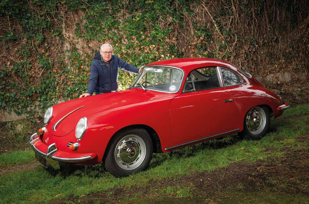 Red Porsche with owner