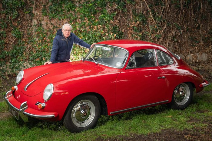 Red Porsche with owner