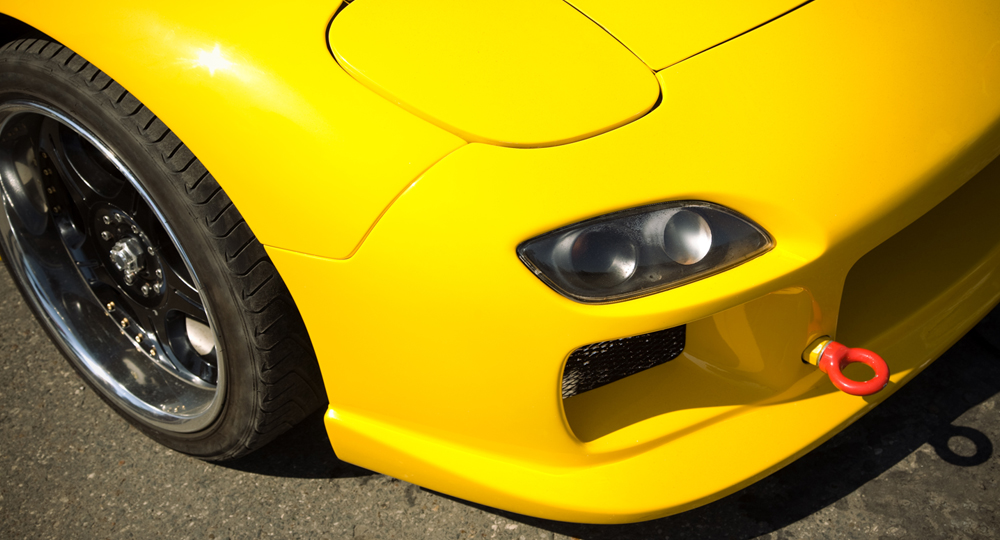 Close-up of yellow car