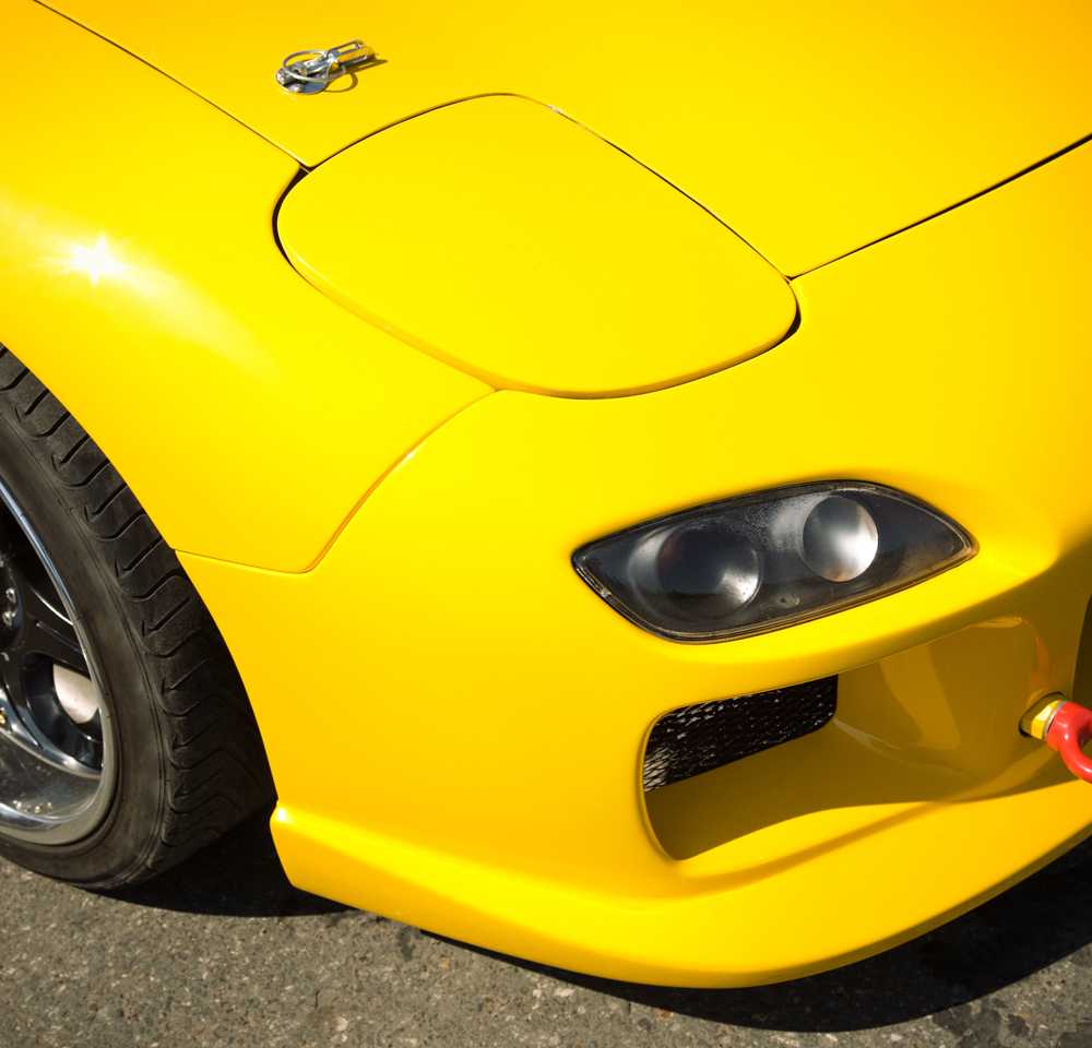 Close-up of yellow car