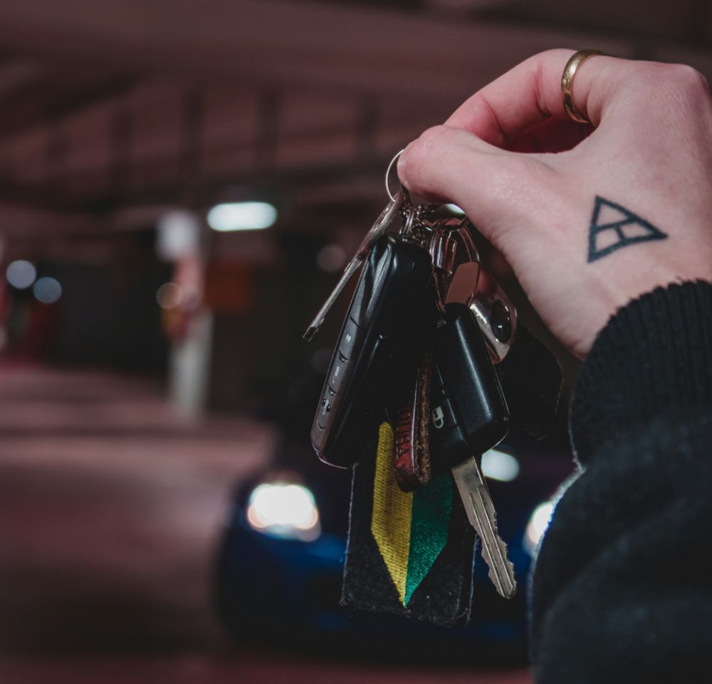 Student holding a bunch of car keys