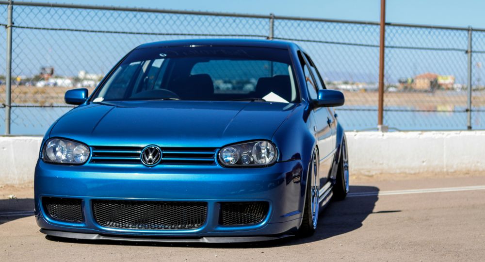 Modified blue golf parked up