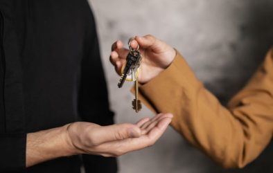 Two people exchanging keys