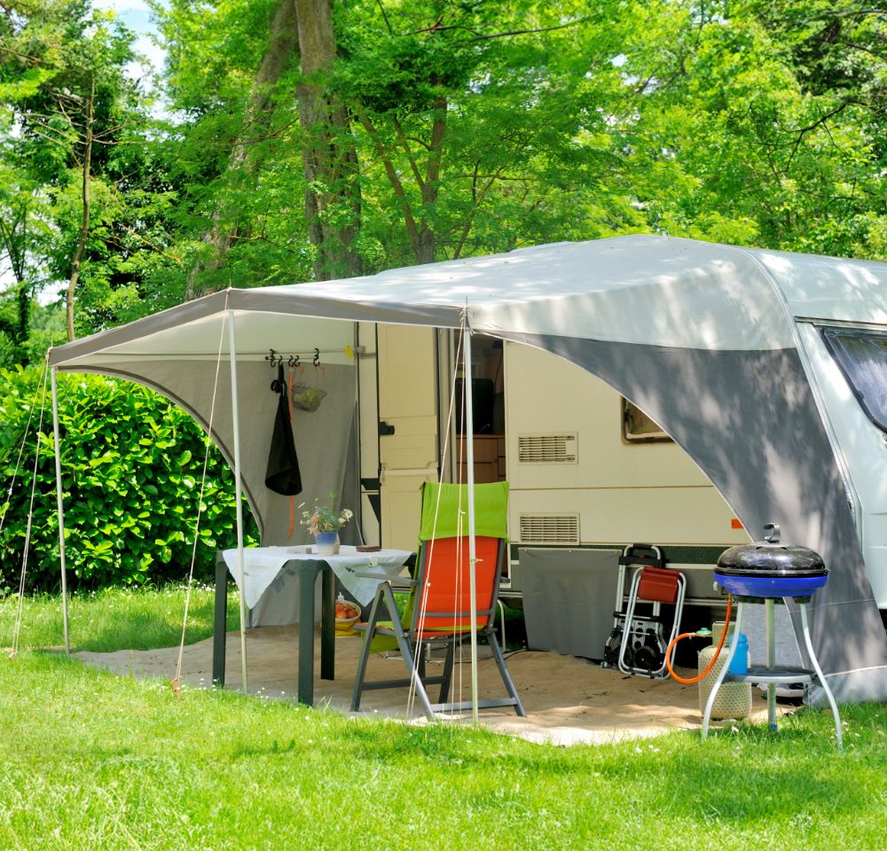 Caravan set up with awning