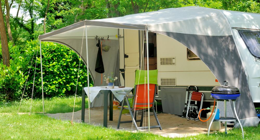 Caravan set up with awning