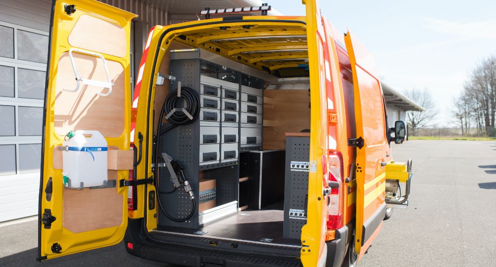 Back doors of van open with equipment on show