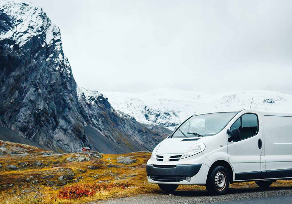 Van with mountains in the background