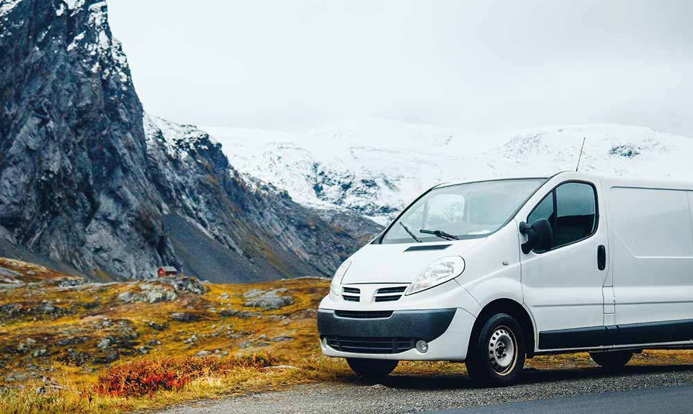 Van with mountains in the background