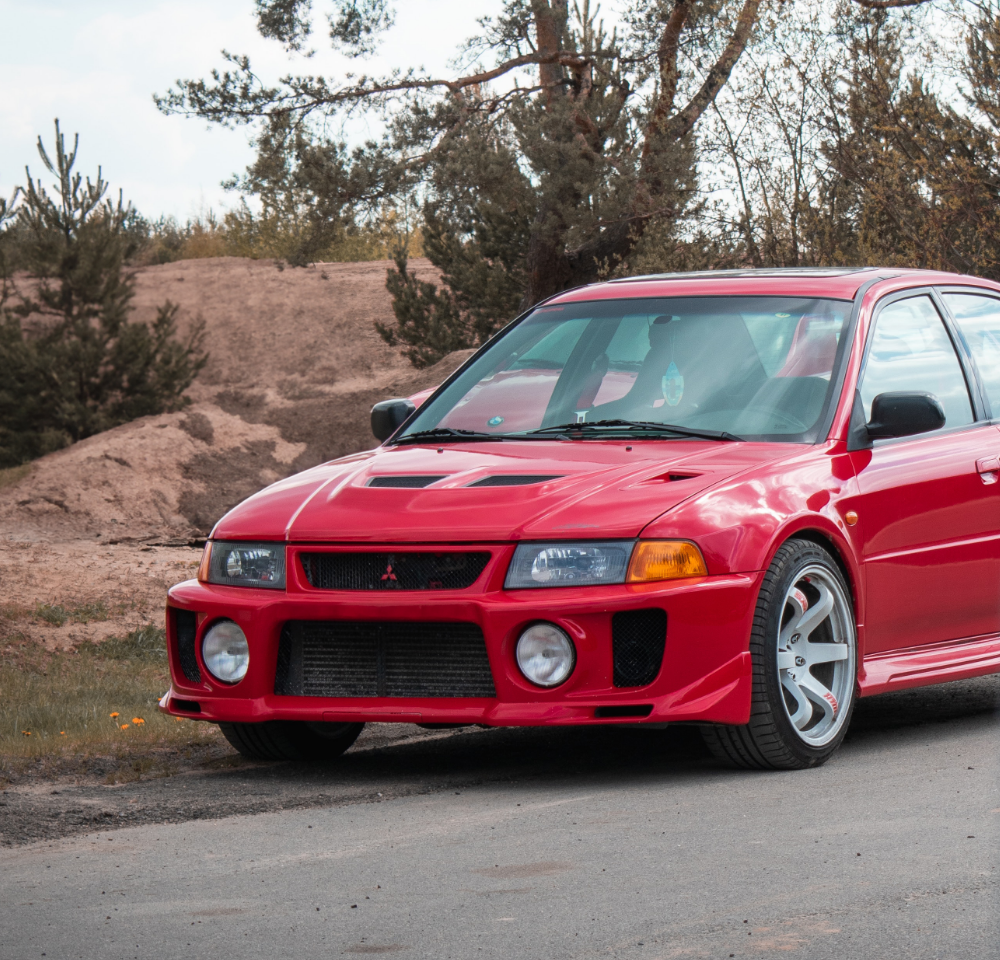 Mitsubishi Evo on the side of the road